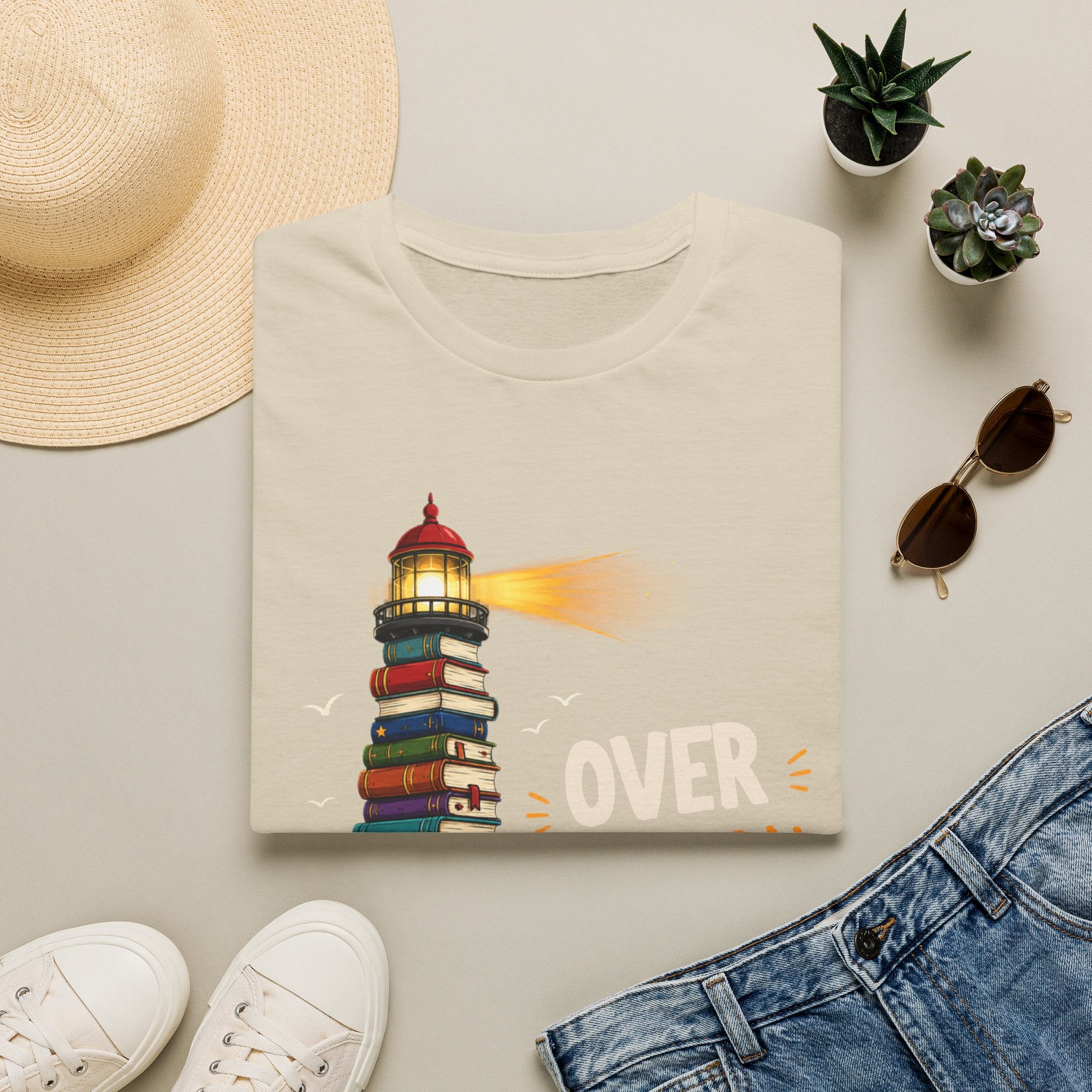 'Over the Horizon' Lighthouse Stack of Books Graphic Tee – Reading Lights the Way