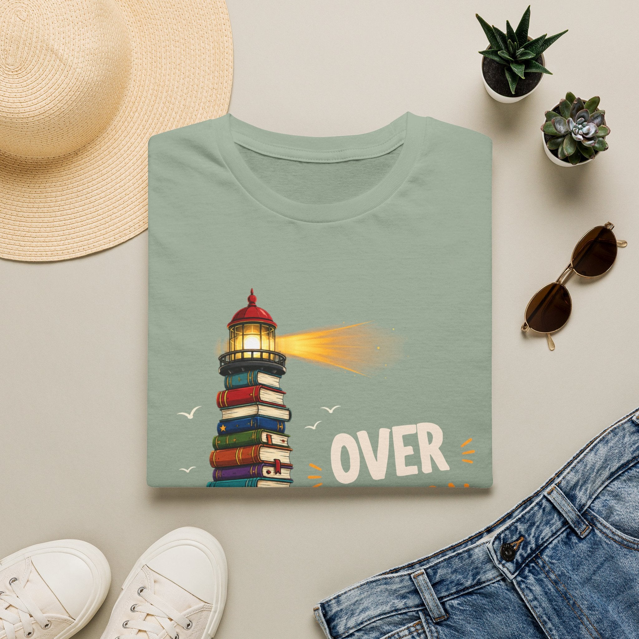 'Over the Horizon' Lighthouse Stack of Books Graphic Tee – Reading Lights the Way